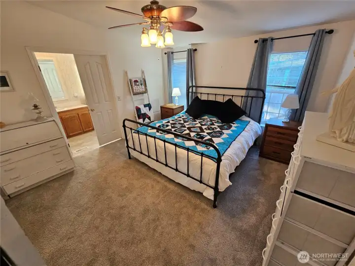 Huge primary bedroom with en-suite bathroom.