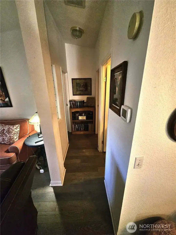Hallway to bedrooms two and three and the full-size hall bathroom.