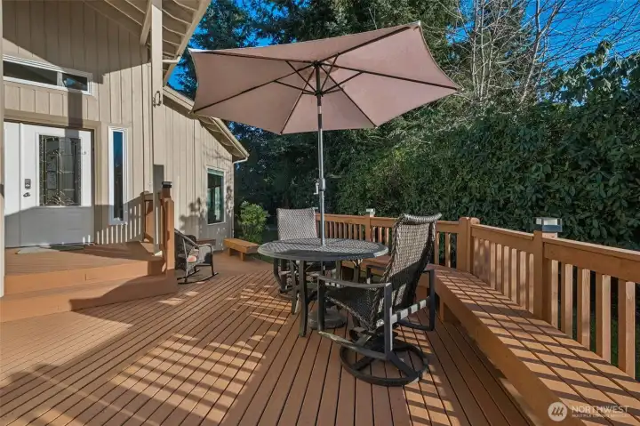 Large entertaining deck with outdoor dining & gathering space, faces the afternoon sun!