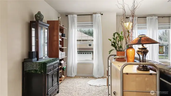 Thoughtfully placed living room nook creates an ideal space for a desk, reading corner, or added storage.