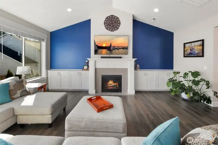 Centered on the fireplace, this view shows off the clean lines and built-ins that make the space feel balanced and put together.