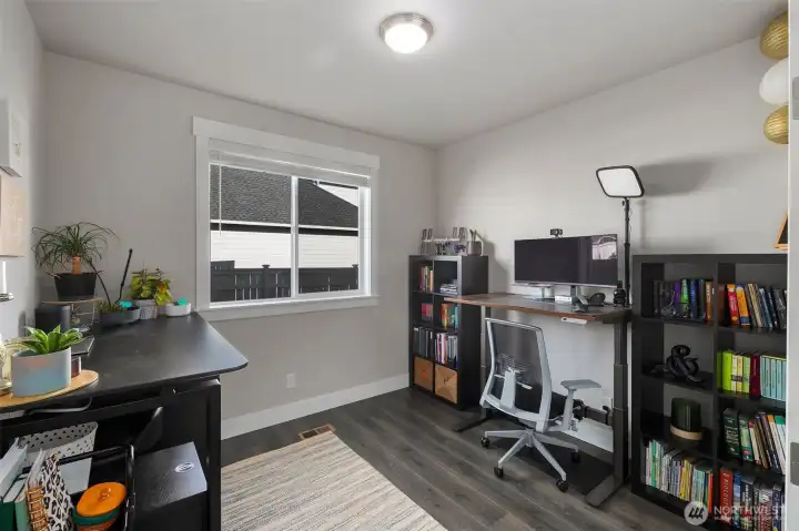 Flexible room set up as a home office, with great natural light and space for working or studying from home.