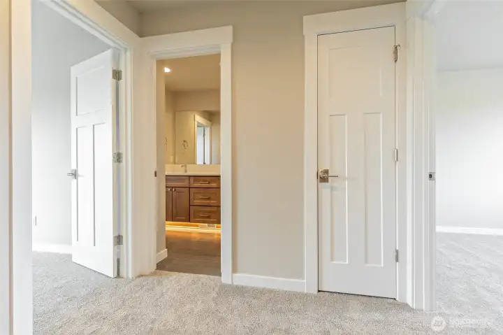 Upper level with three guest bedrooms and shared bath