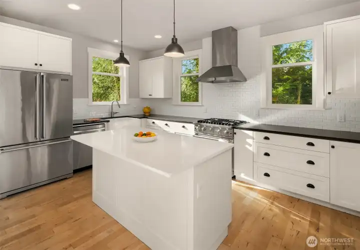 Superb kitchen with stainless appliances. and gas range.