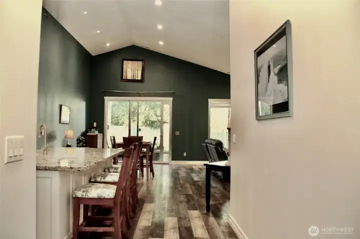Spacious entry opens to inviting floor plan with flexible uses.