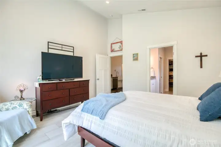 Large primary suite with easy access to the en suite bath and walk-in closet.