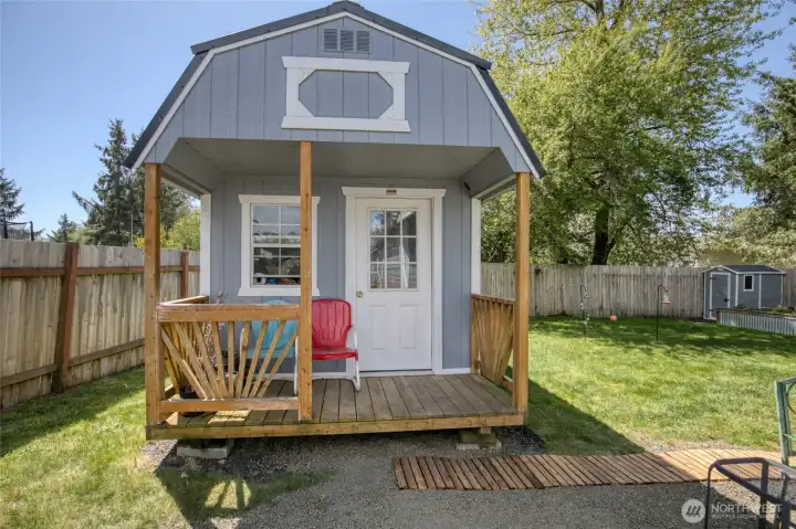 10x20 Old Hickory shed with cute covered porch is pre-wired - ideal for storage, hobbies, or a workspace.