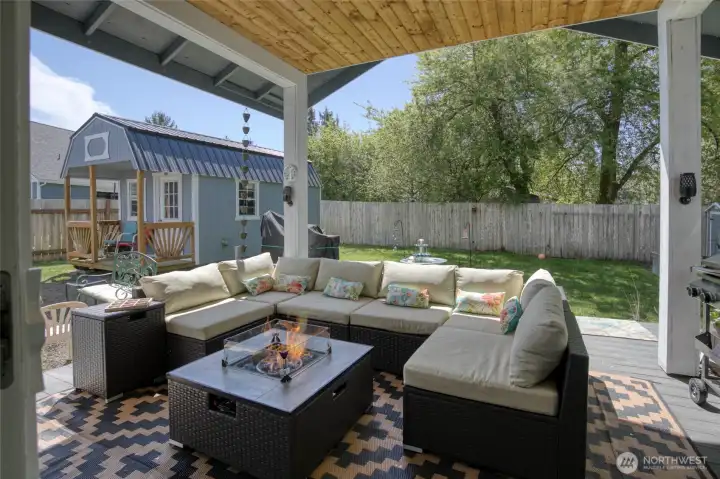 Finished covered deck extends your living space outdoors, where you can enjoy the ocean breeze and distant sound of the waves.