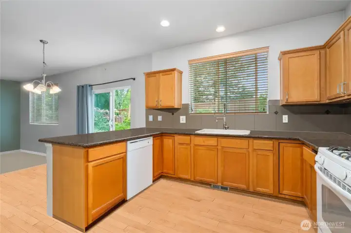 Kitchen with Maple Cabinets and Granite Counters,  Photoshopped to remove personal items still in the home