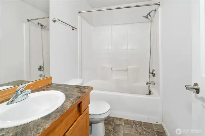 Full Bathroom on Upper Floor,  Photoshopped to remove personal items still in the home