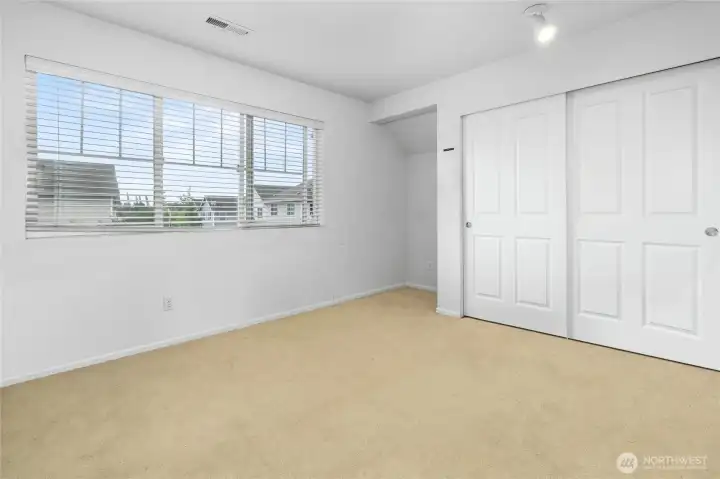 Bedroom #3, Photoshopped to remove personal items still in the home