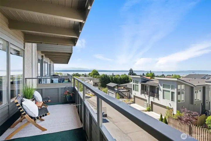 Stunning sound and mountain views from this one level condo with sprawling balcony in the heart of Downtown Edmonds.