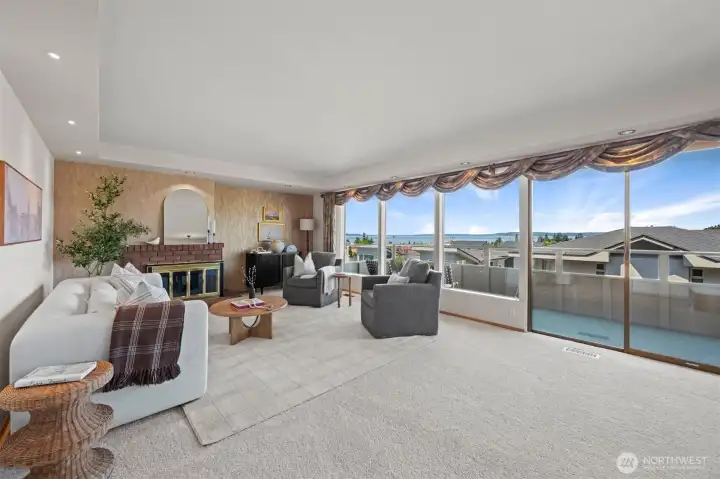 Living room with picture windows to enjoy the incredible view and the Edmonds Ferry.