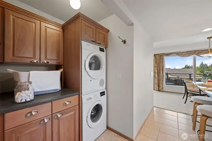 Wow! Utility room with plenty of storage, washer and dryer stay, and this is a ventless dryer!