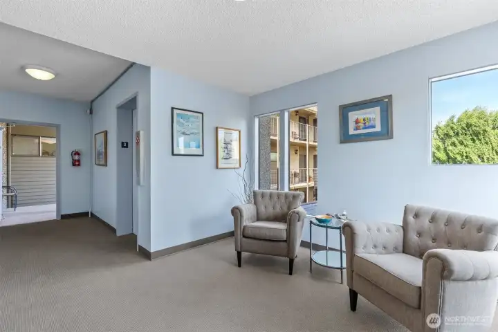 Third floor lobby and only two units share the walkway to your new home.