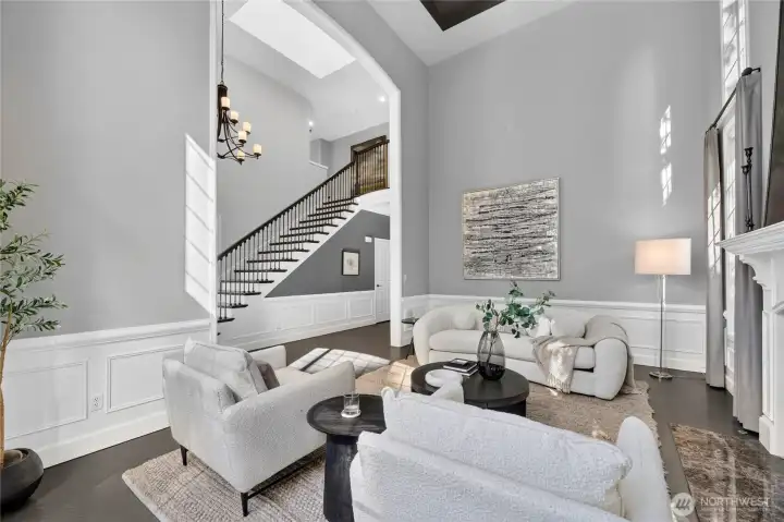 Dramatic 2 Story Light Filled Living Room