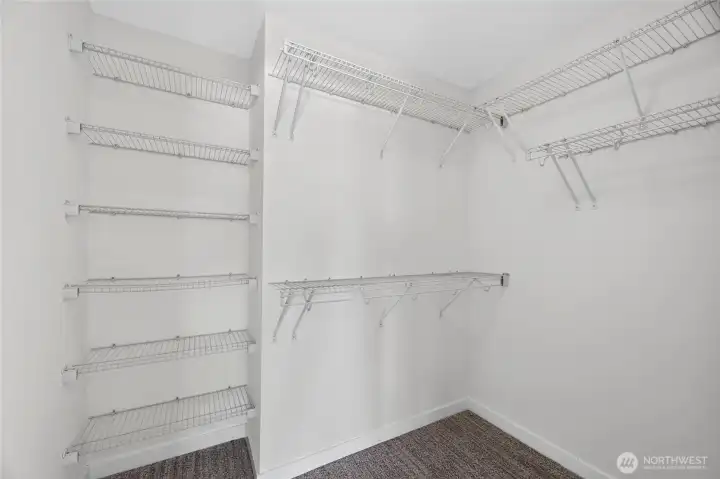 Primary walk-in closet.