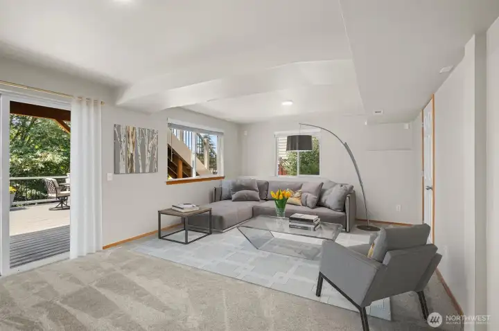 Massive lower family room w/ slider to private deck.