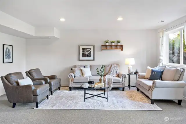 To the lower level - space galore . . starting with this giant Family Room.