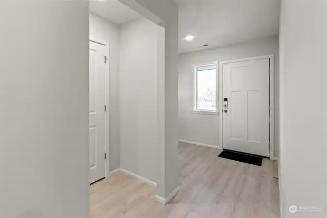 Entry w/bench space-DISCLAIMER: photos are of same floor plan from a previous community and are for illustrative purposes only, finishes, features, upgrades, colors, and features will vary