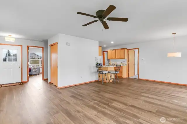 Updated luxury vinyl plank throughout main living areas through laundry room