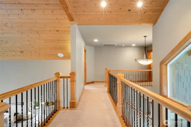 Walkway from primary bedroom to "mini Primary bedroom and full bath.