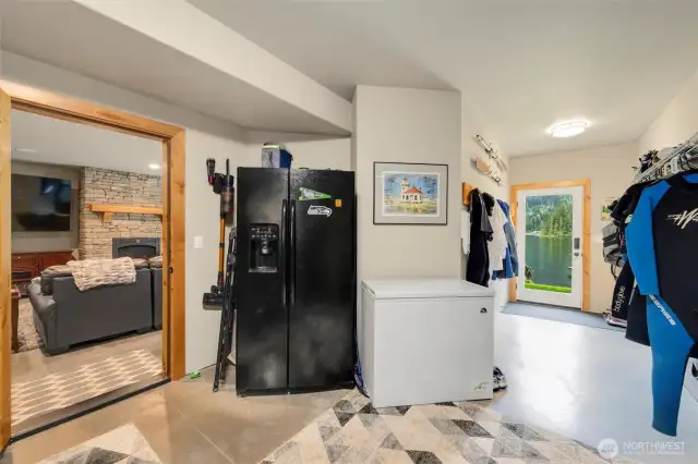 Storage/exercise area located off of "movie room" single door leading to back patio and lake. Lots of area to store all your lake gear