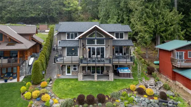 Beautiful view of this stunning come. The landscaping was meticulously chosen by the owners