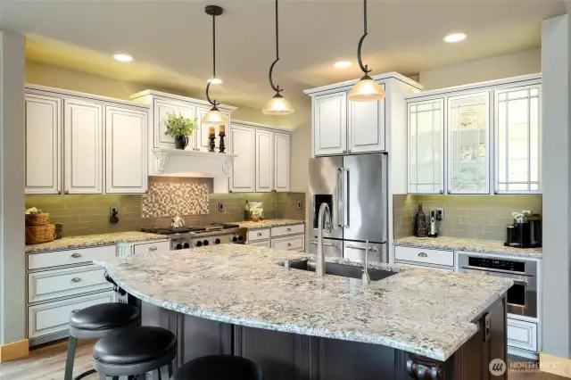 Large Kitchen Island, custom Huntwood cabinets, granite countertops