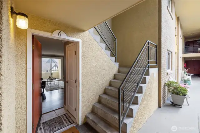 Main floor unit, entry from courtyard. Stairs to secure garage near by.