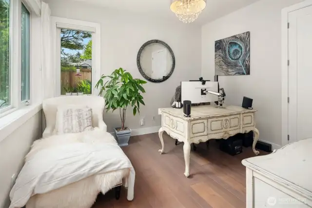 Main floor Den or 4th bedroom with a closet and adjacent 3/4 bathroom