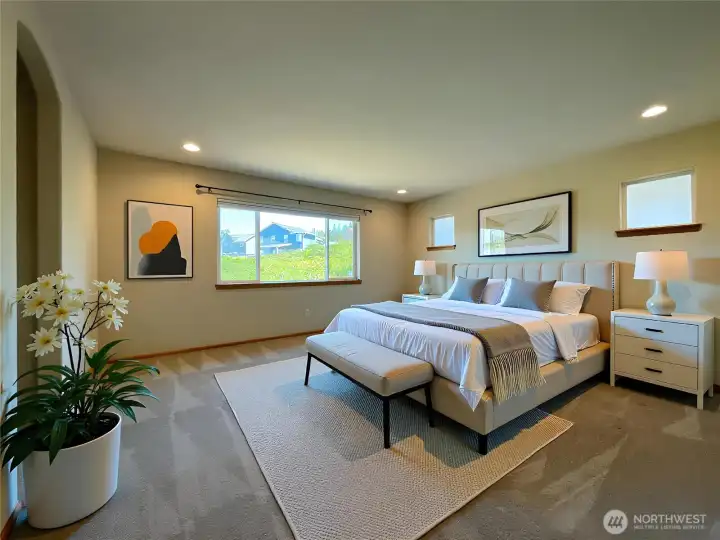 Primary bedroom with en-suite bathroom and two walk-in closets