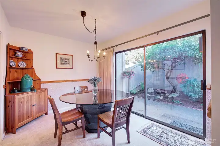 Dining room with access/view to private patio