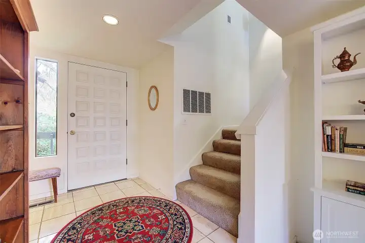 Front door and stairs to upper level