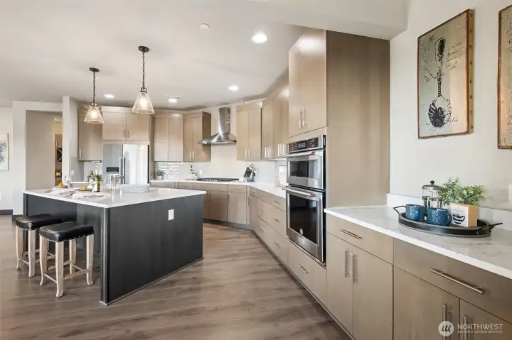 Beautifully designed kitchen with expansive countertops, built-in appliances, and a generous island ideal for everyday living and entertaining.