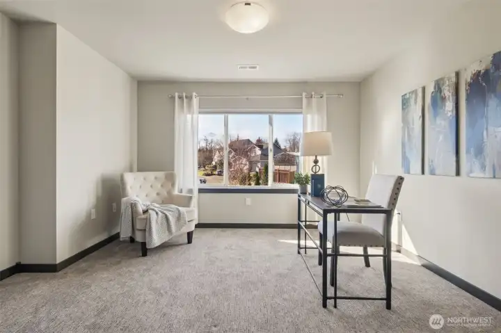 The slightly smaller bedroom still has all the space you need! And, a lovely territorial view. (3)