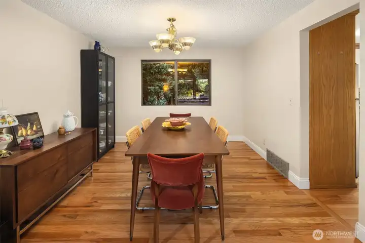 Formal dining area facing your backyard and direct access to kitchen and deck