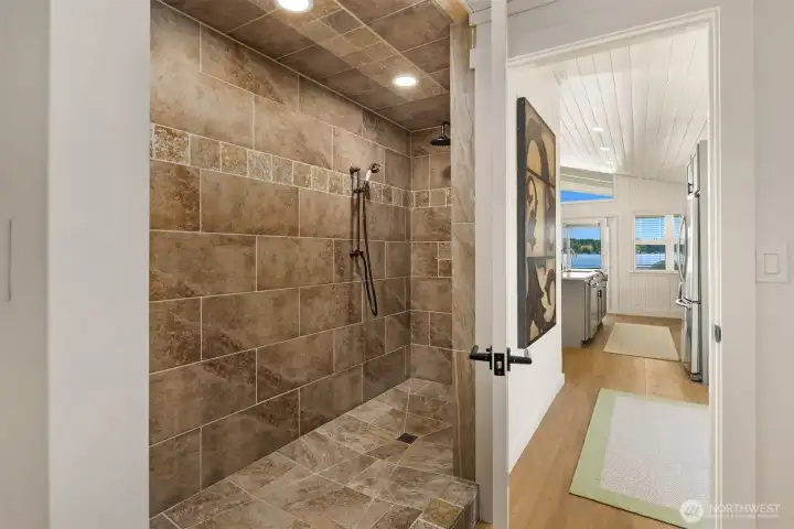 Gorgeously tiled shower with a spa-like feel.