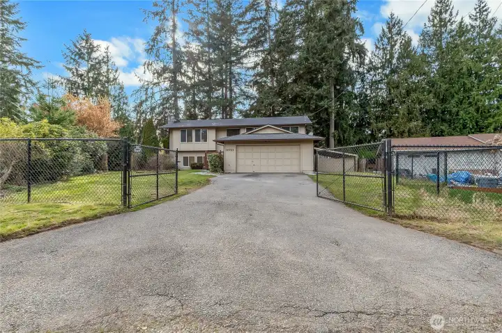 Full fenced and gated lot. Full fenced and gated lot.