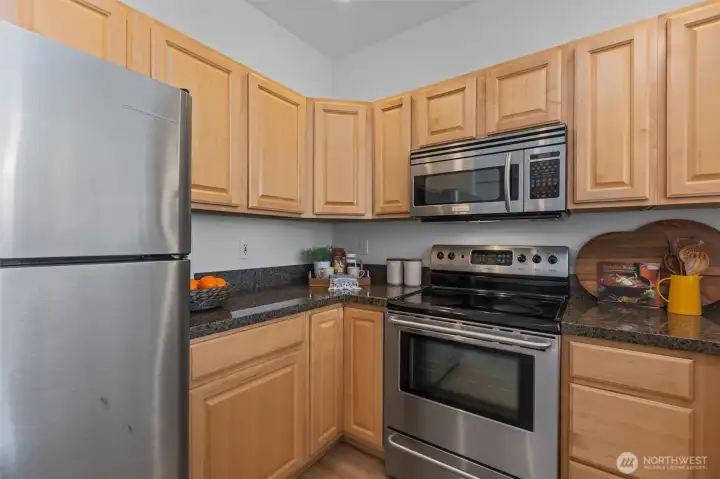 Fully equipped kitchen with classic stainless steel appliances
