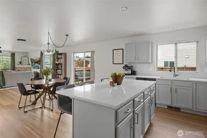 Enjoy creating delectable bites in this beautiful kitchen while being part of the conversation in the rest of your open concept area.