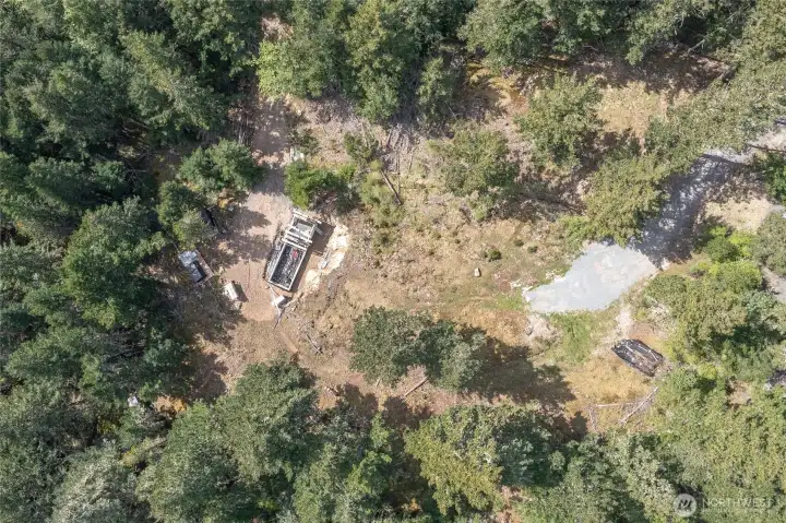 Two separate building areas. The Greenhouse site is lower on the property with an access road, the main home and ADU building site is up above for the glorious views.