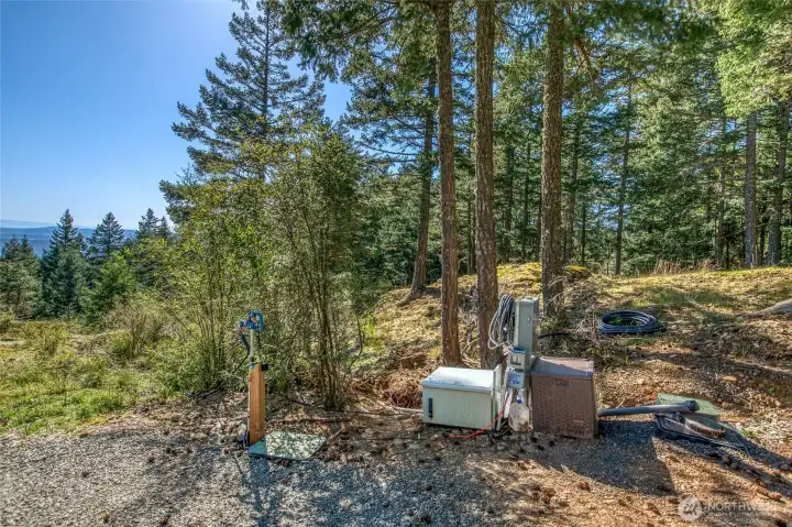 Water, power, fiber optic is all installed. An approved septic design is ready for installation.