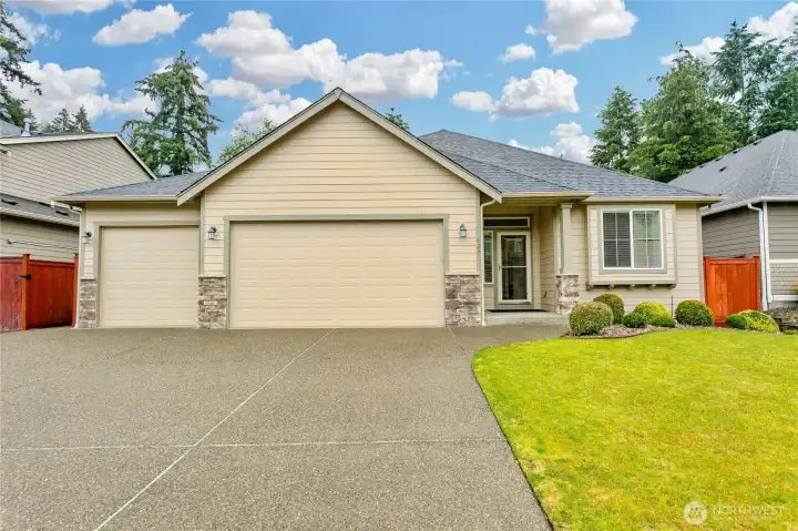 Three car garage with driveway Three car garage with driveway