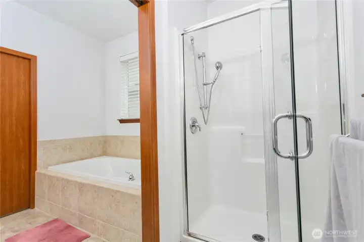 Separate shower and bath in primary bathroom Separate shower and bath in primary bathroom