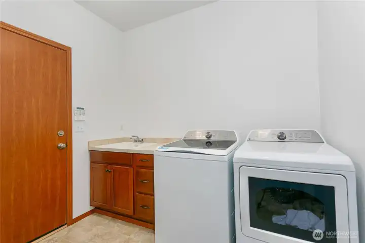 Laundry room with brand new washer and dryer Laundry room with brand new washer and dryer