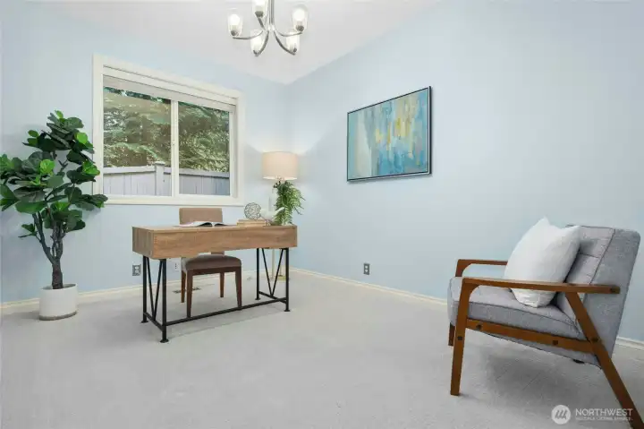 Main floor den. Note the new paint throughout.