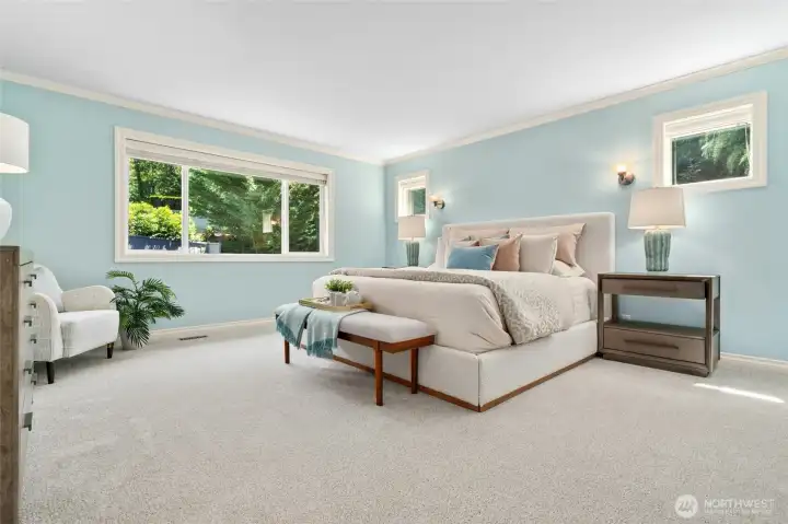 Oversized, luxurious primary suite. Note the new carpeting throughout.