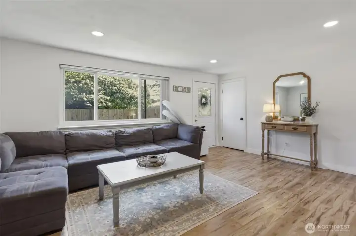 Large family room with lots of natural light.