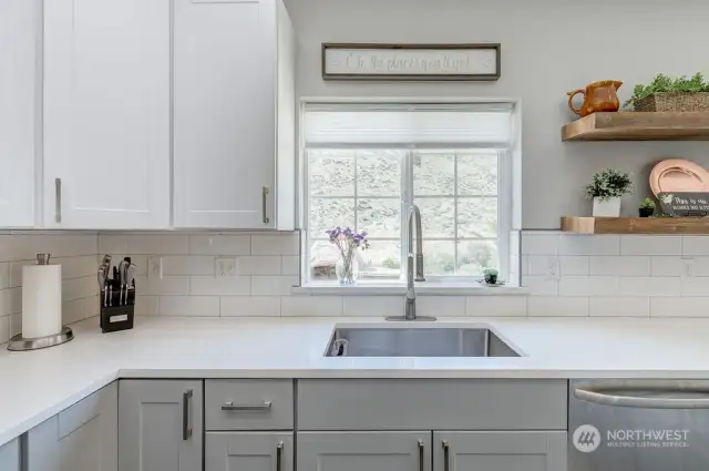 Farm sink and modern gray cabinetry